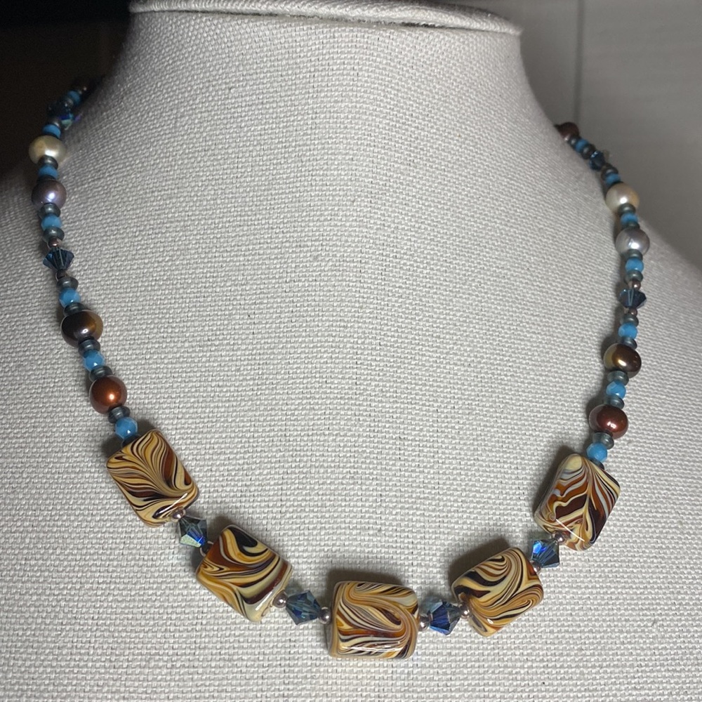 Beautiful swirled lamp work bead crystal necklace
